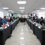 A foto mostra os presidentes dos CRMVs sentados durante a CNP.