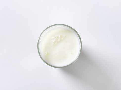 glass of milk on white background