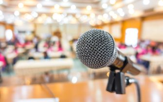 Black microphone in conference room