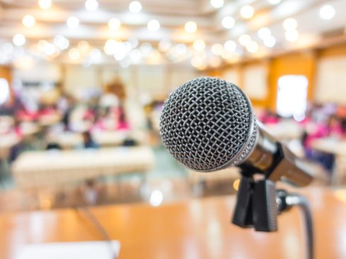 Black microphone in conference room